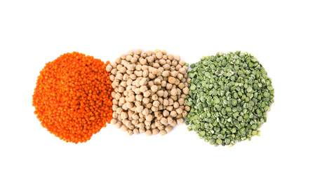 Photo of Different types of legumes on white background, top view. Organic grains
