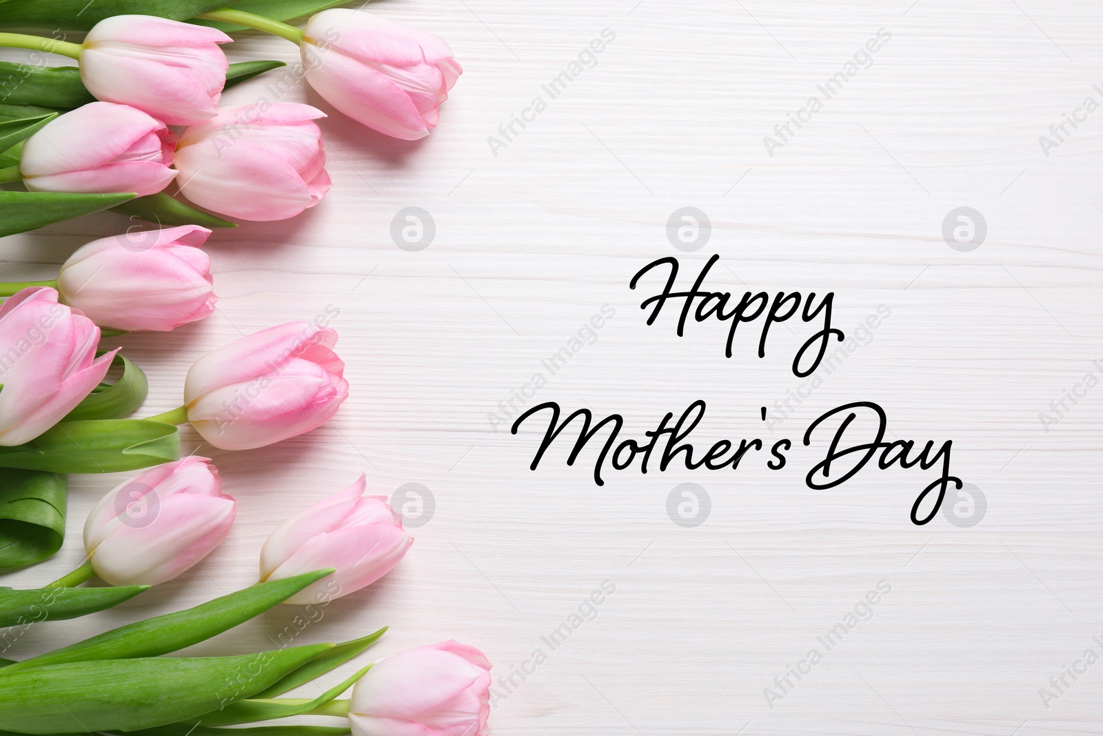 Image of Happy Mother's Day. Greeting card with tulip flowers on white wooden background, top view