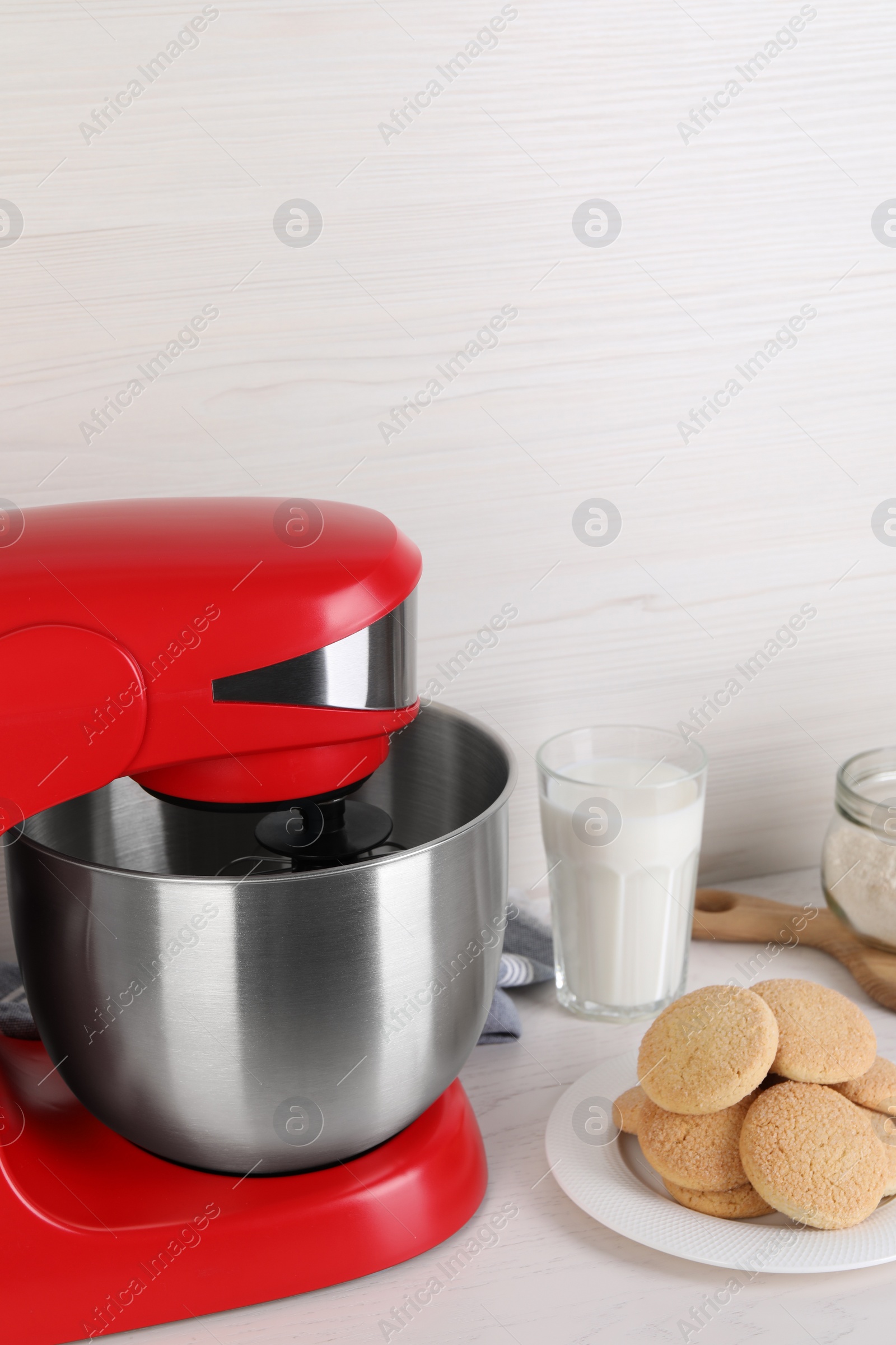 Photo of Composition with modern red stand mixer and different products on white table