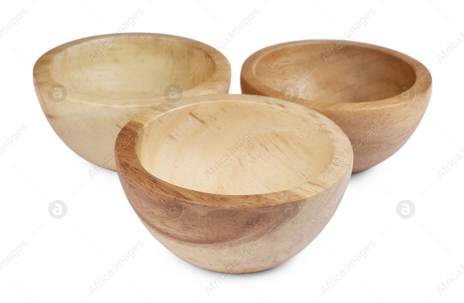 Photo of Set of wooden bowls on white background