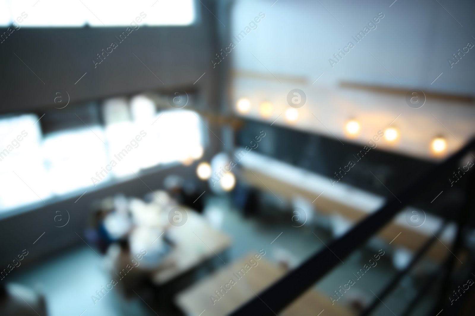 Photo of Blurred view of modern comfortable office interior