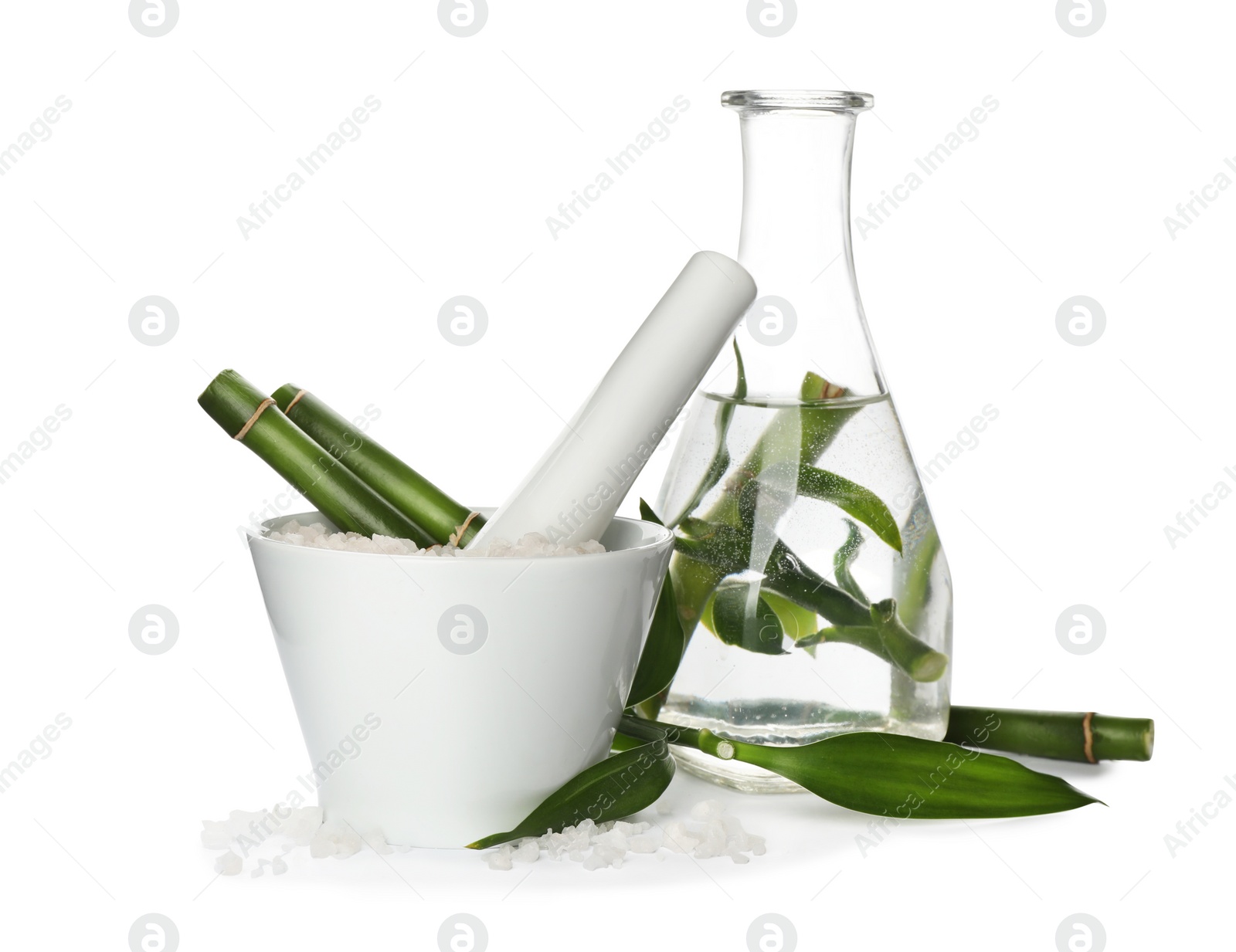 Photo of Composition with fresh bamboo and bath salt on white background. Spa procedure