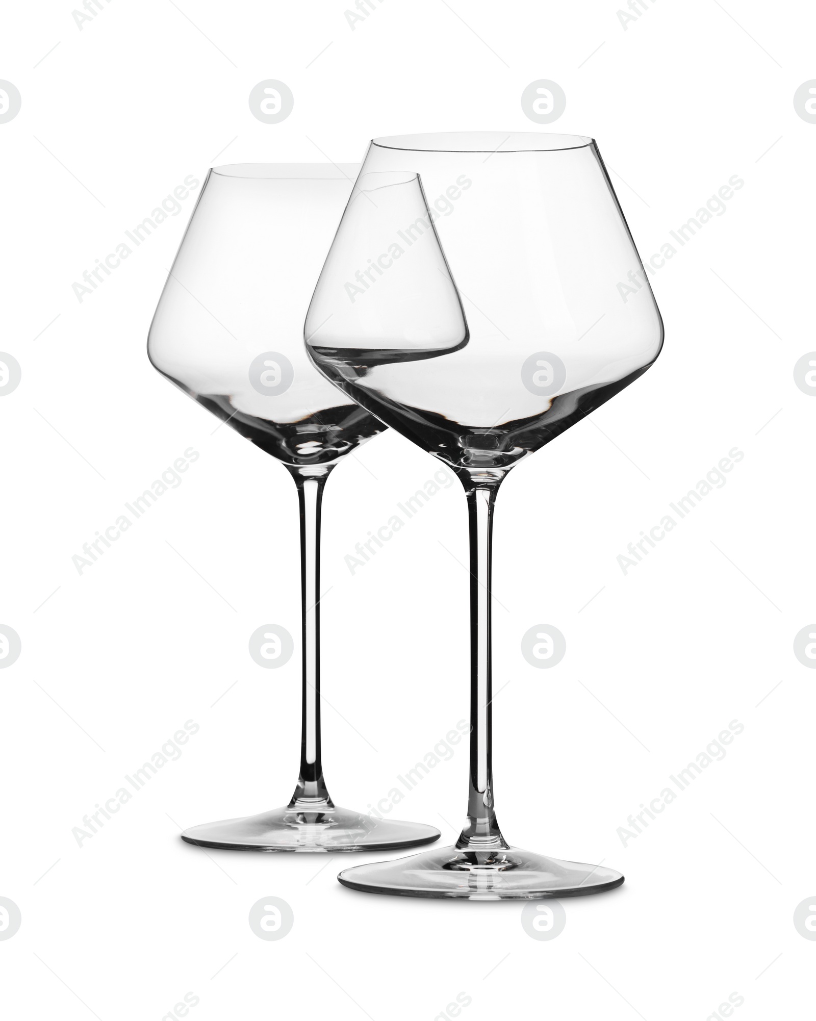 Photo of Two stylish clean glasses isolated on white