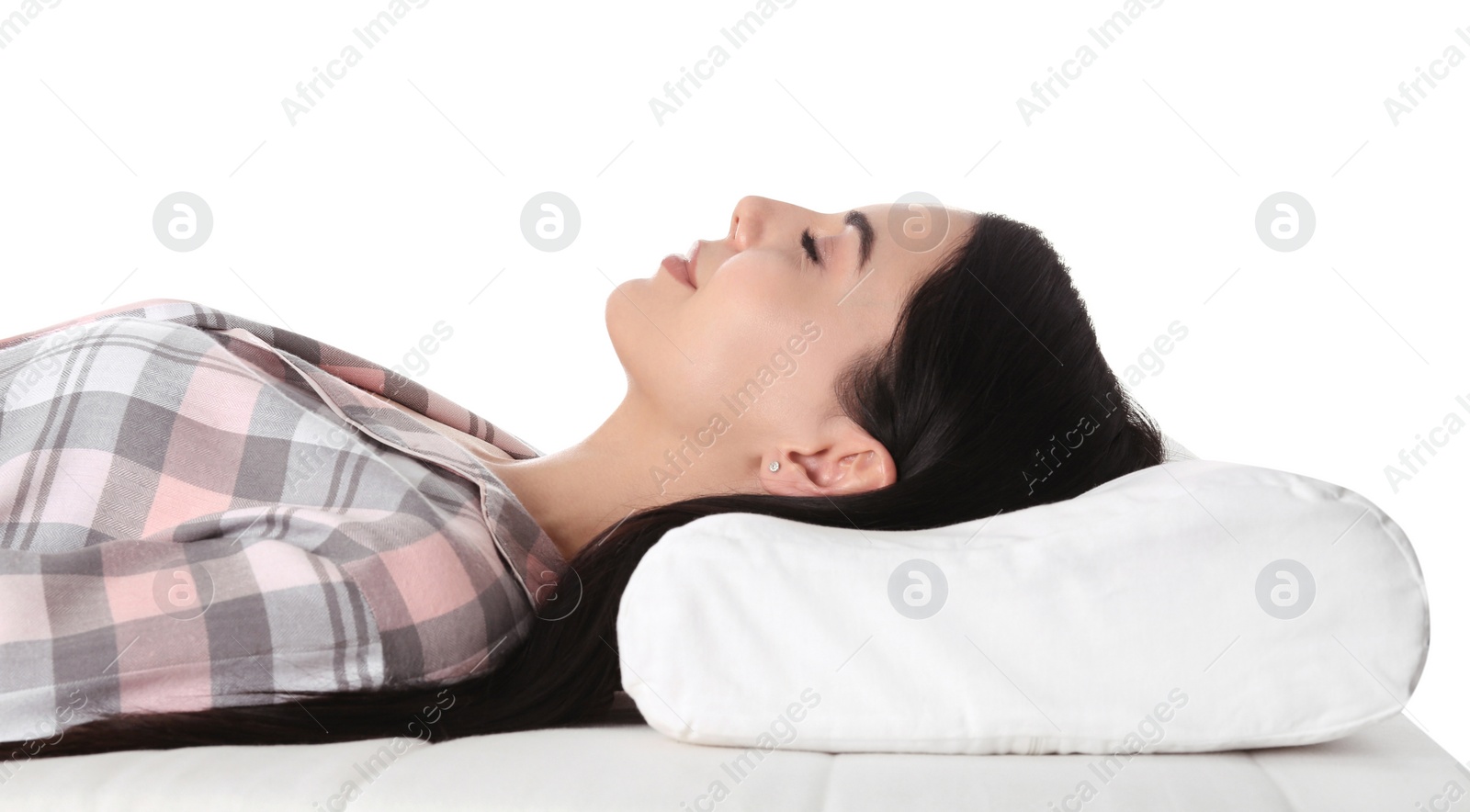 Photo of Young woman sleeping on orthopedic pillow against white background, closeup