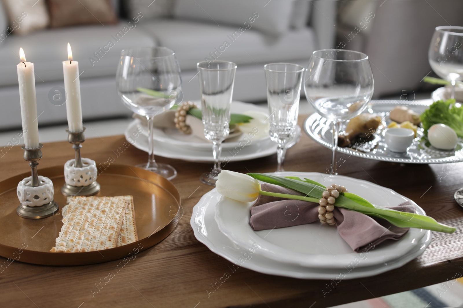 Photo of Festive Passover table setting at home. Pesach celebration