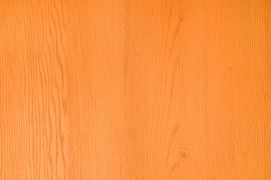 Image of Texture of orange wooden surface as background, closeup