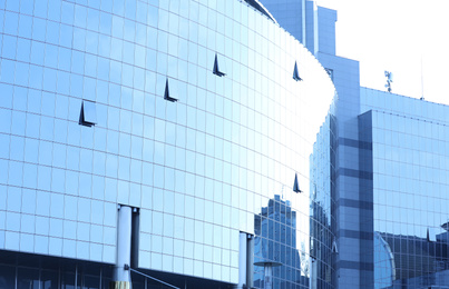 Photo of Office building with tinted windows. Modern architectural design