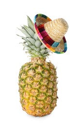 Photo of Pineapple with Mexican sombrero hat isolated on white