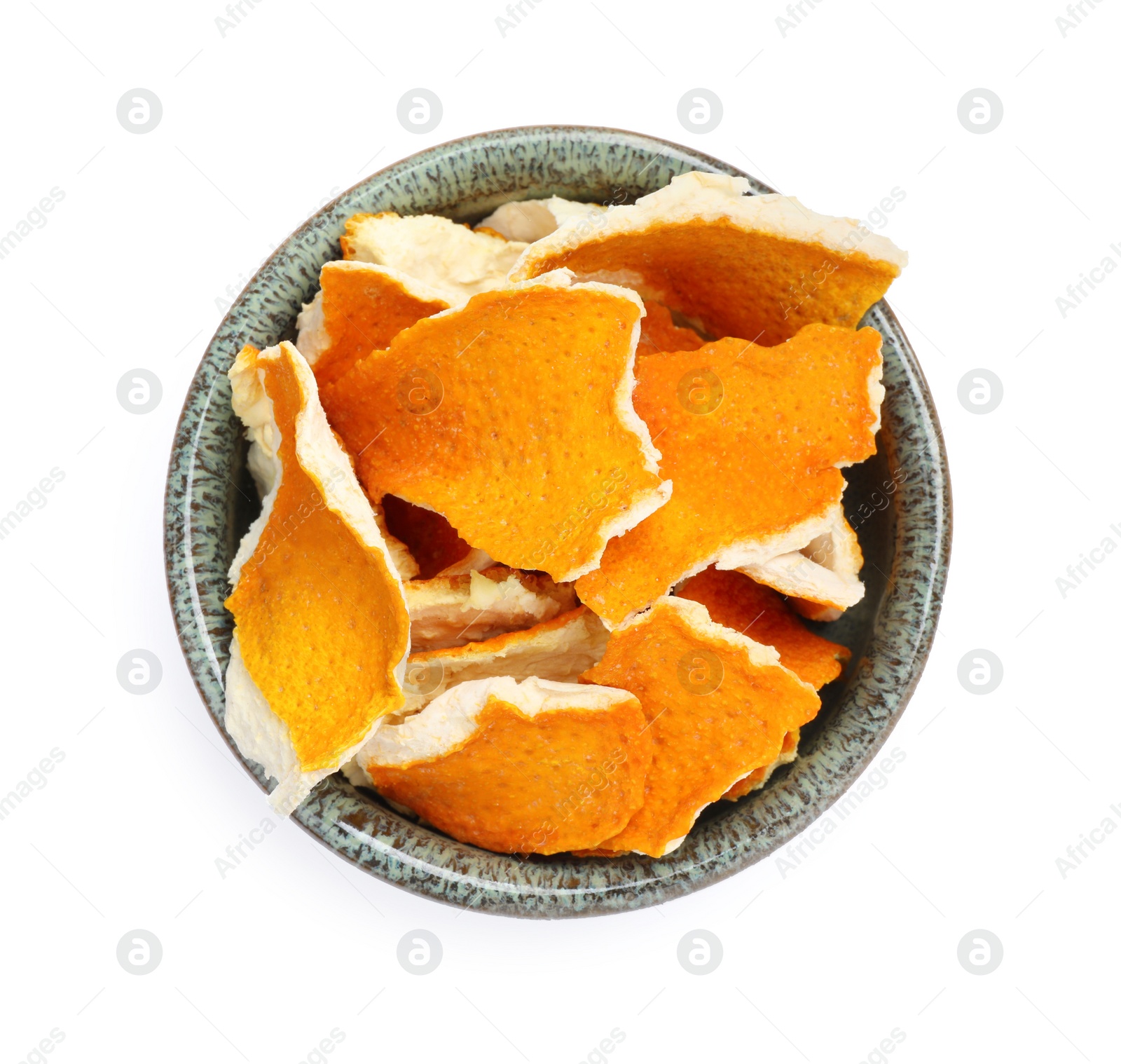 Photo of Dry orange peels in bowl isolated on white, top view