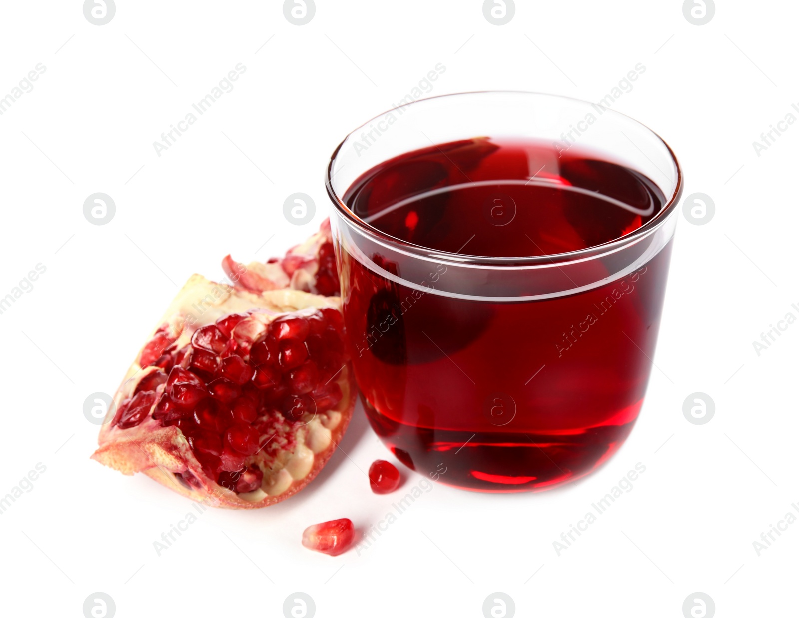 Photo of Freshly made pomegranate juice in glass on white background