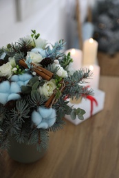 Beautiful wedding winter bouquet on wooden table indoors