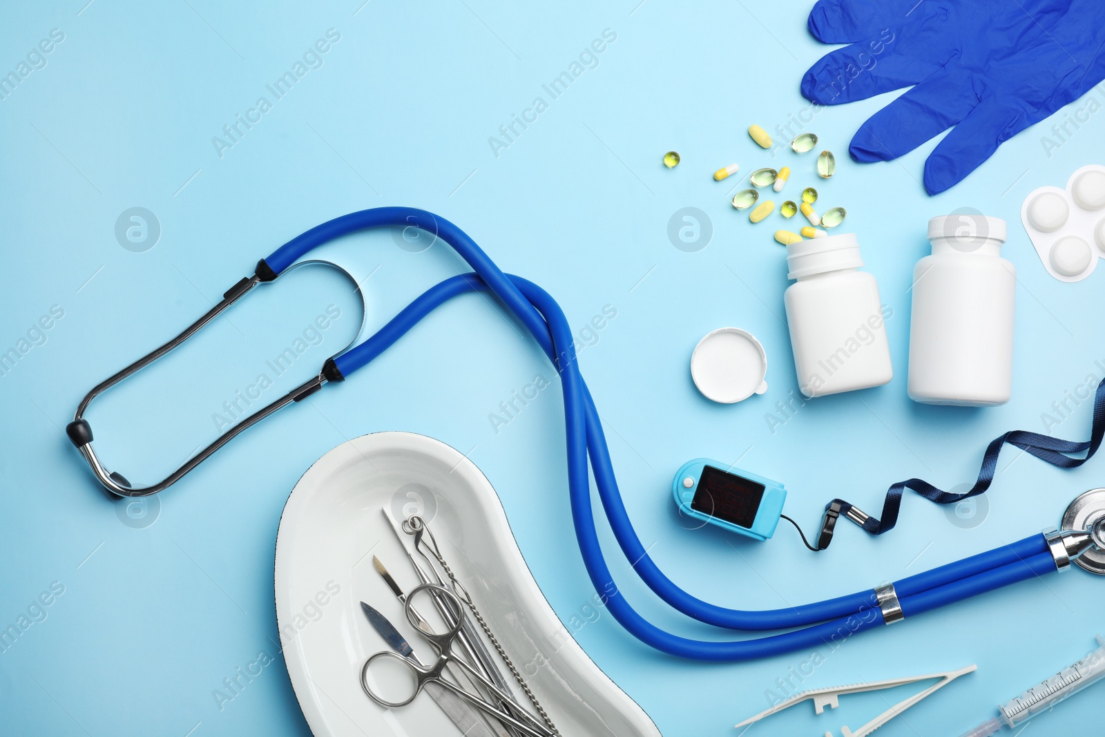 Photo of Flat lay composition with medical objects on color background