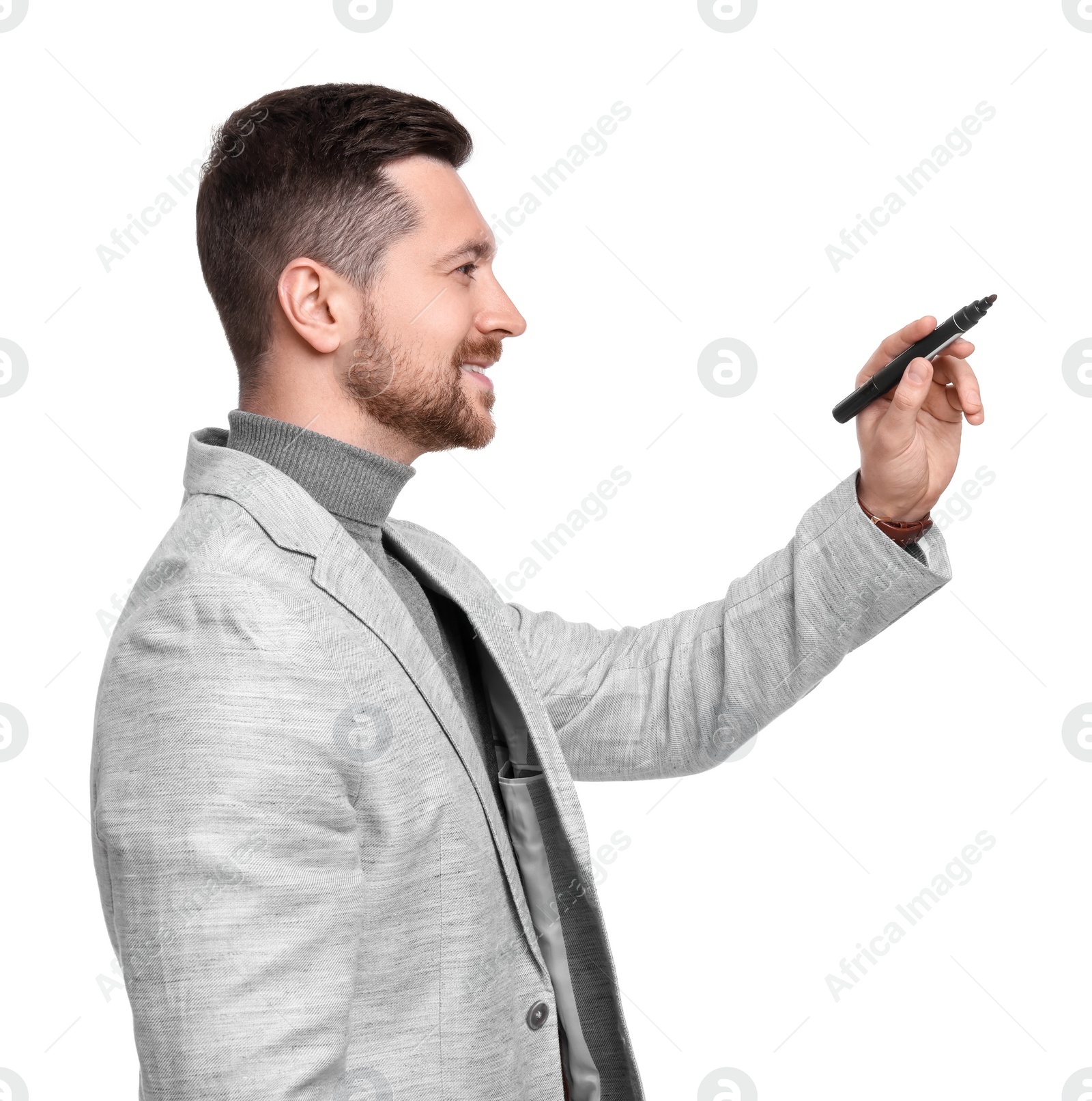 Photo of Handsome bearded businessman with marker on white background