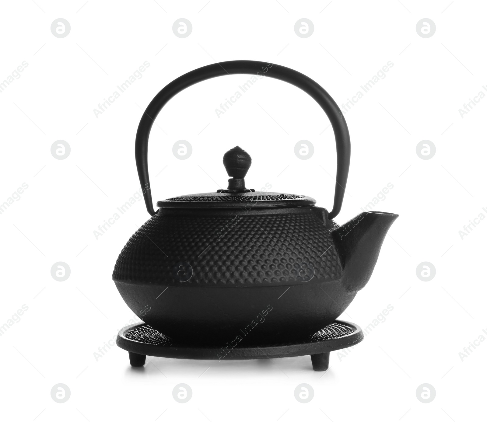 Photo of Black teapot with stand isolated on white