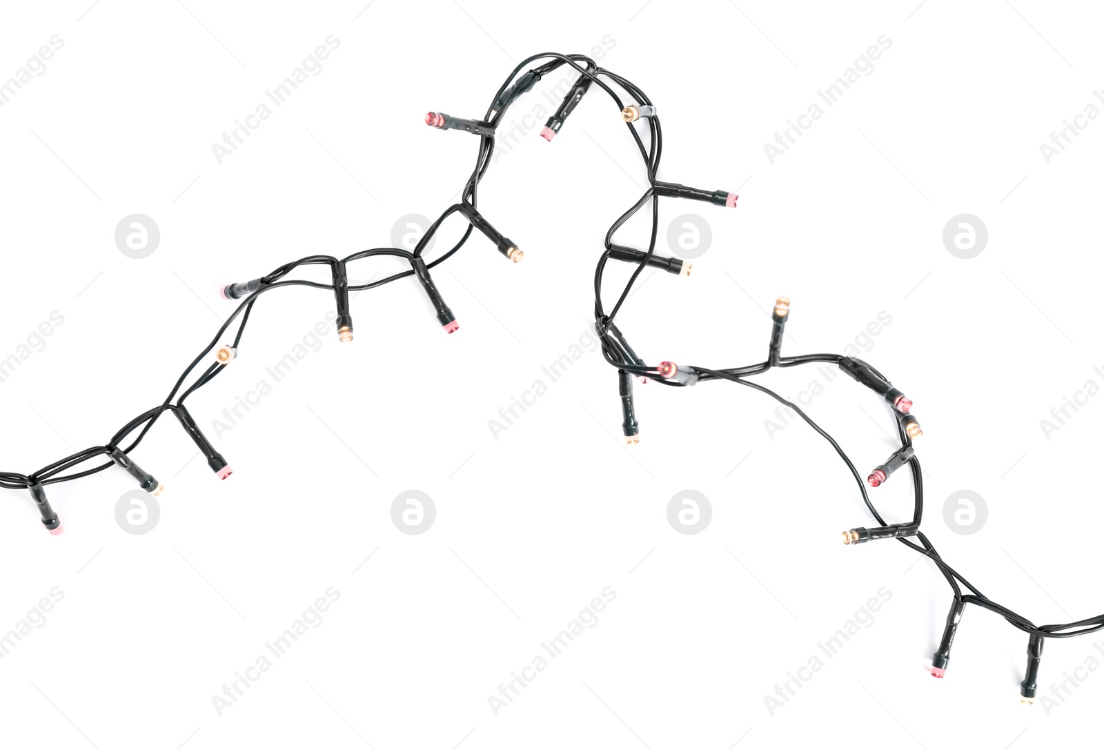 Photo of Beautiful Christmas lights on white background, top view