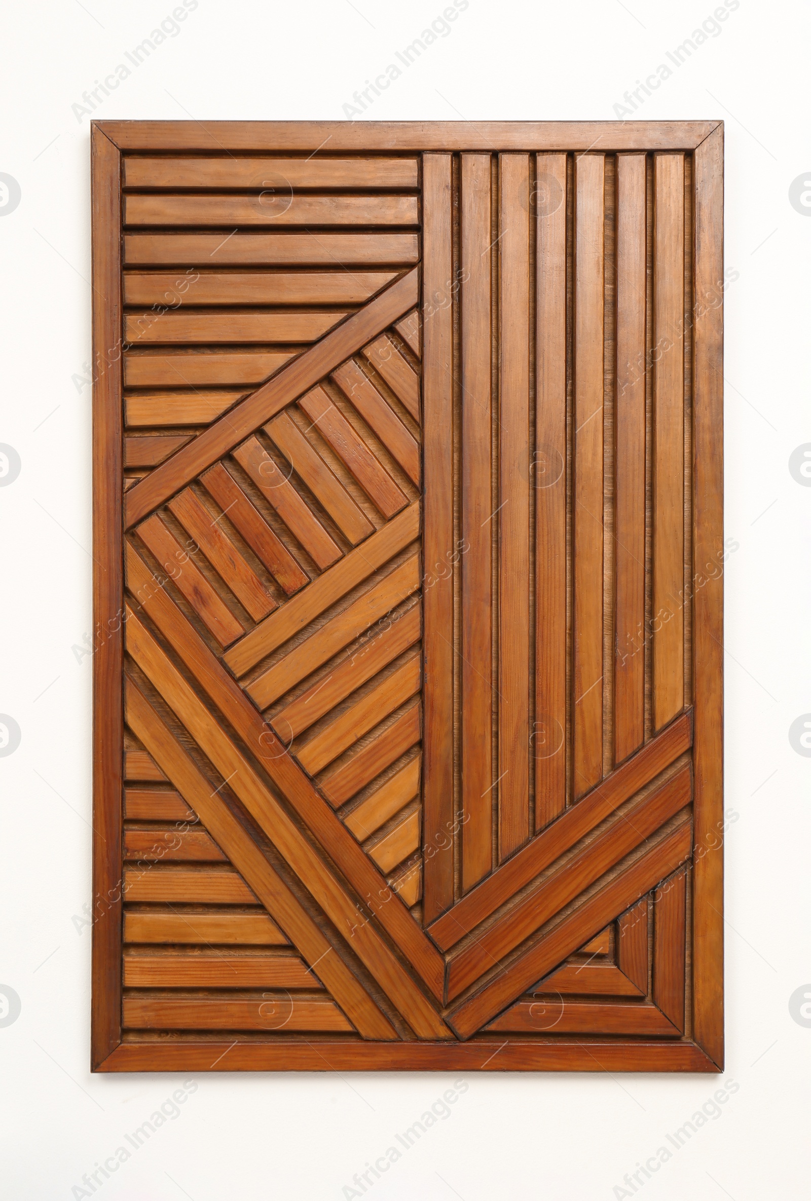 Photo of Wooden wall panel isolated on white, top view