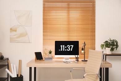 Photo of Room interior with comfortable workplace. Modern computer on wooden desk