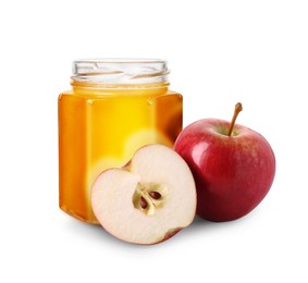 Image of Honey in glass jar and apples isolated on white