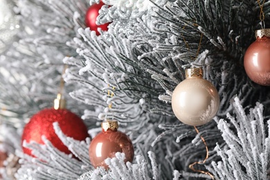 Beautiful Christmas tree with festive decor on background, closeup