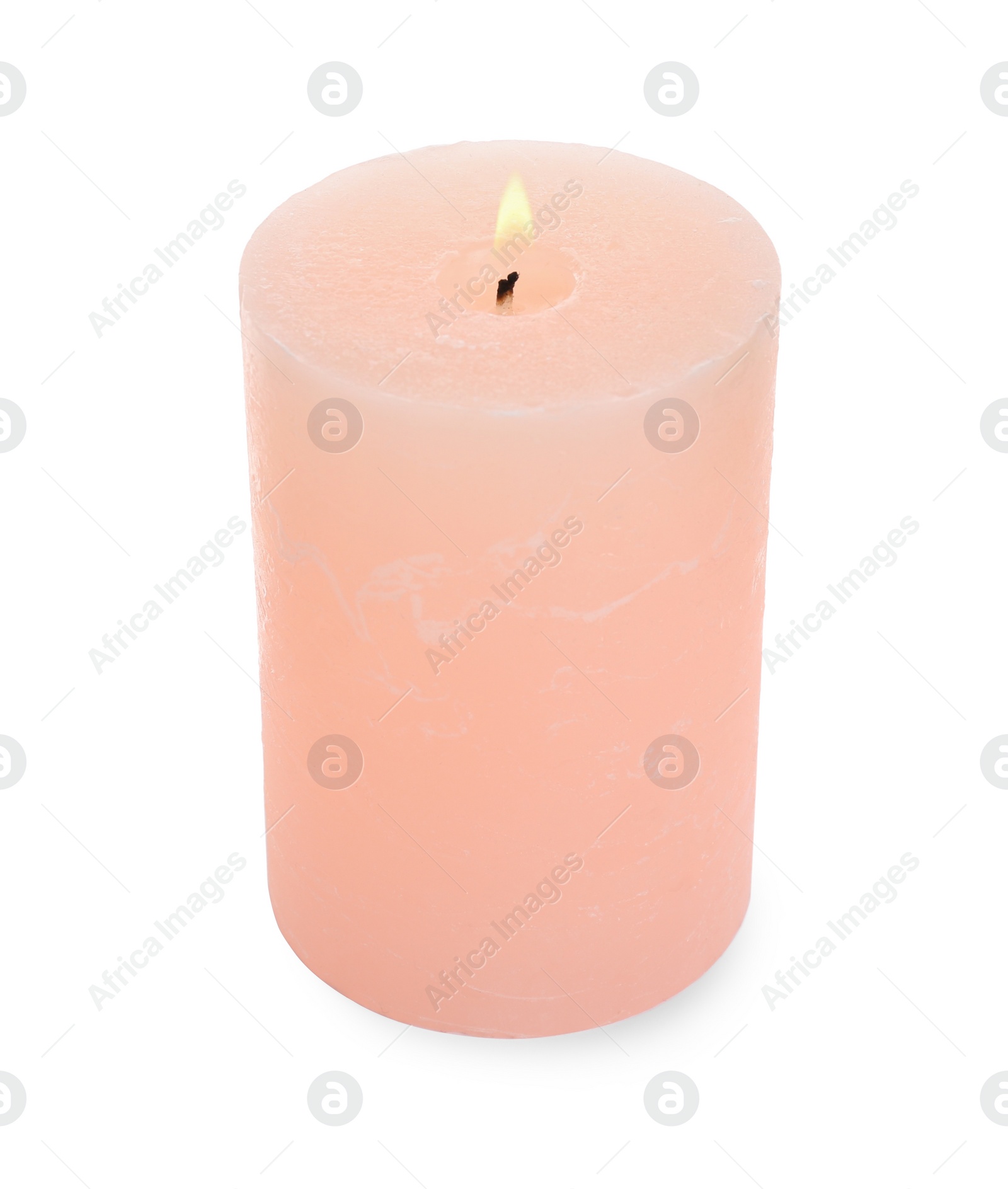 Photo of New pillar wax candle burning on white background