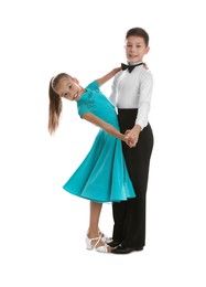 Photo of Beautifully dressed couple of kids dancing on white background