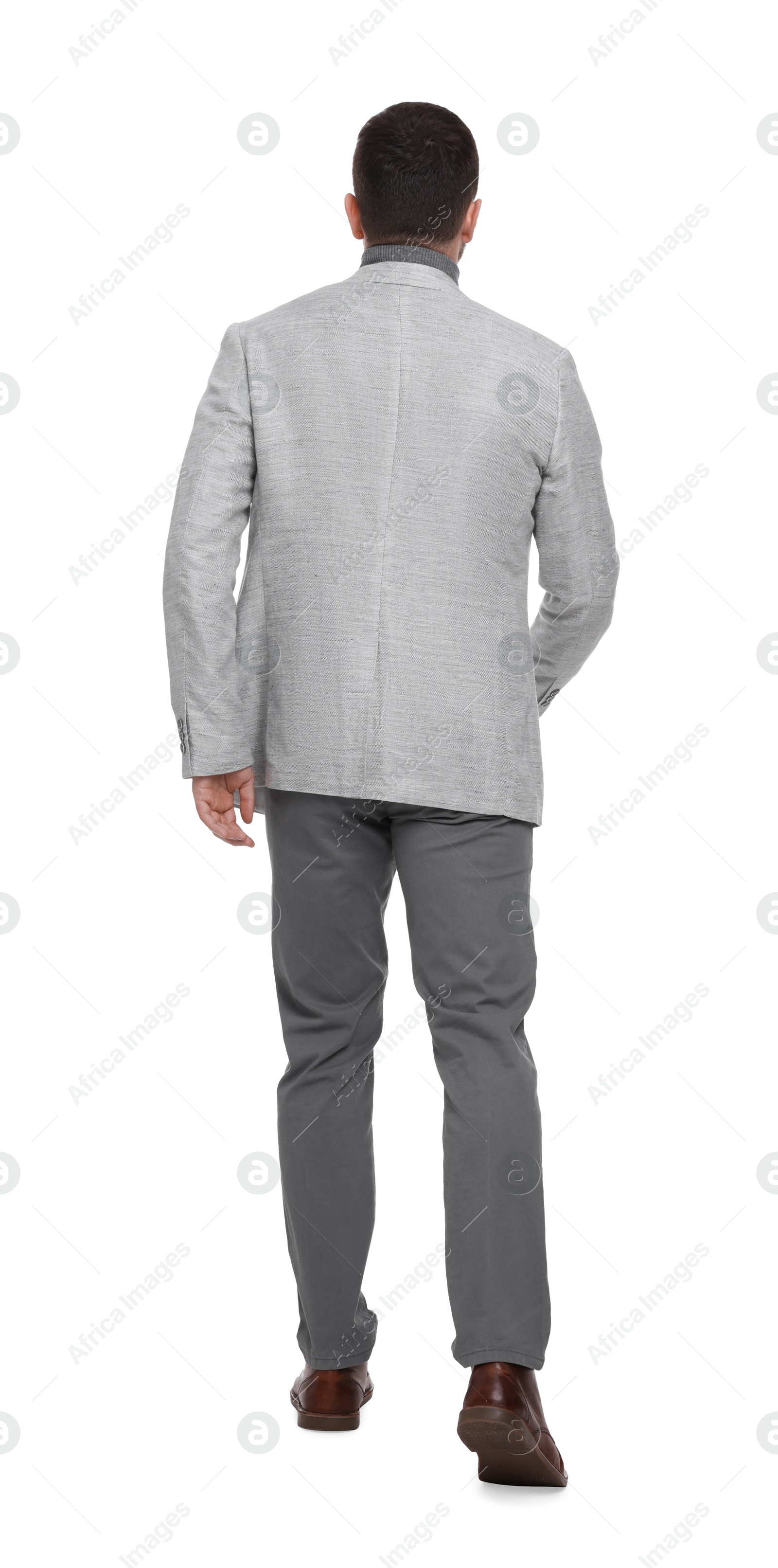 Photo of Businessman in suit on white background, back view