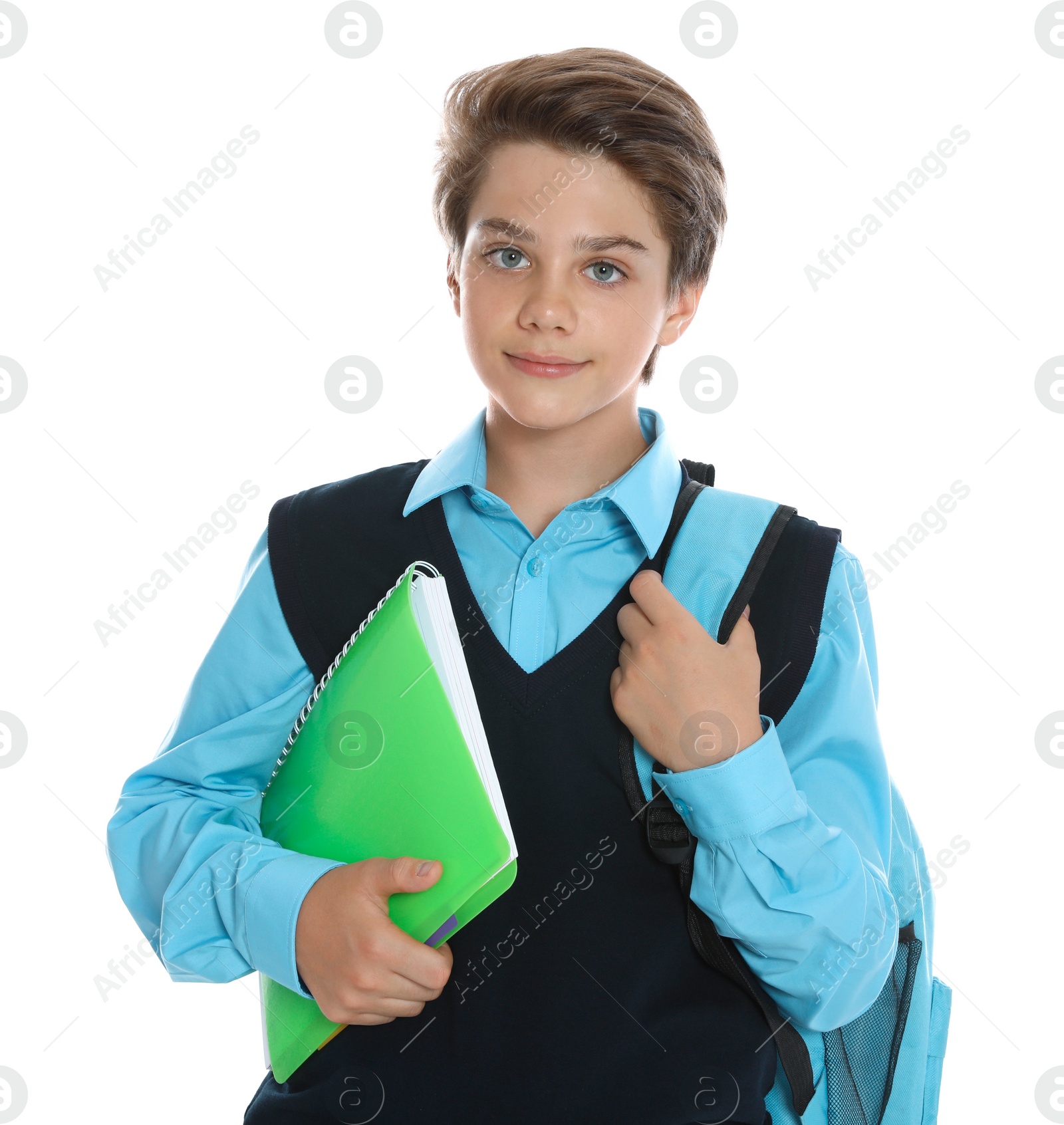 Photo of Happy boy in school uniform on white background