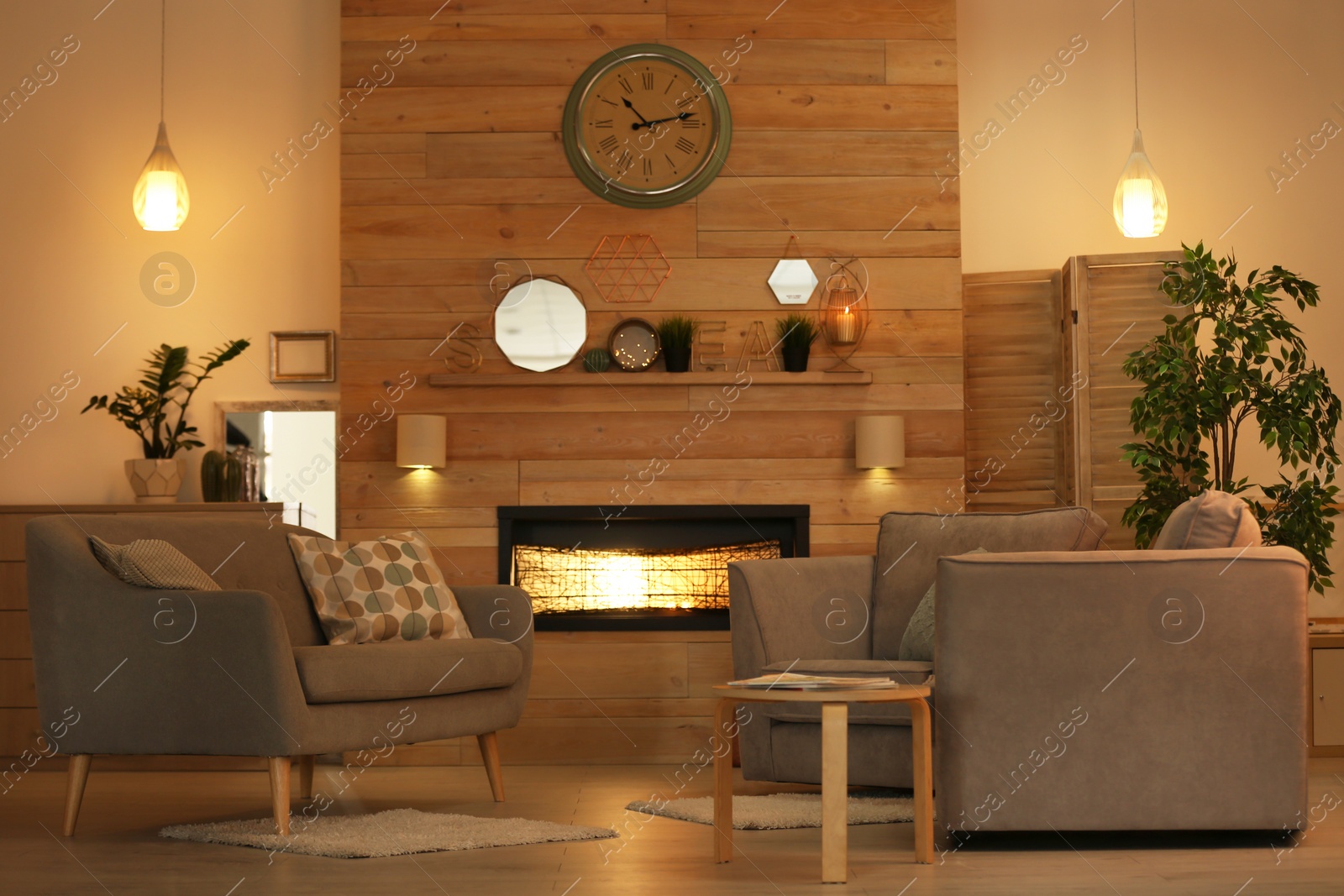 Photo of Cozy living room interior with comfortable furniture and decorative fireplace