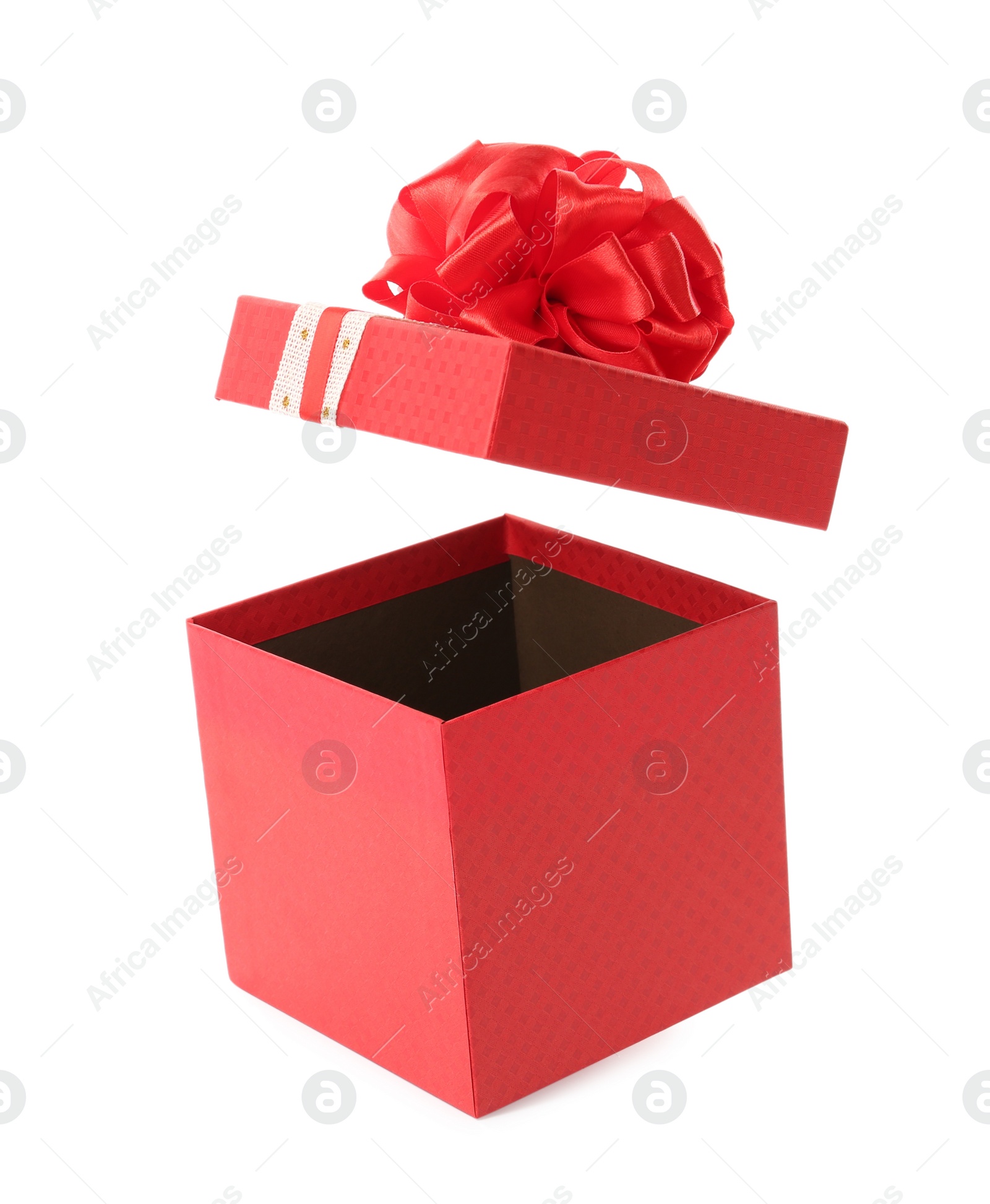 Photo of Red gift box and lid with bow on white background