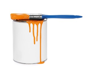 Can of orange paint and brush on white background