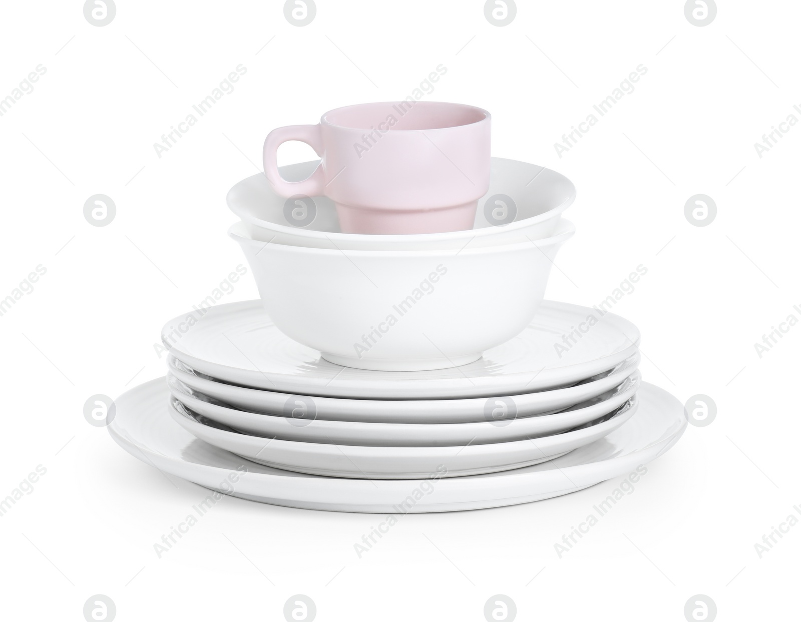 Photo of Beautiful ceramic plates, bowls and cup isolated on white