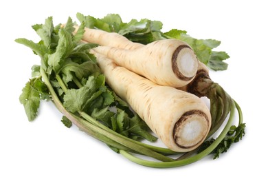 Photo of Tasty fresh ripe parsnips on white background