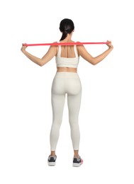 Photo of Woman doing sportive exercise with fitness elastic band on white background, back view