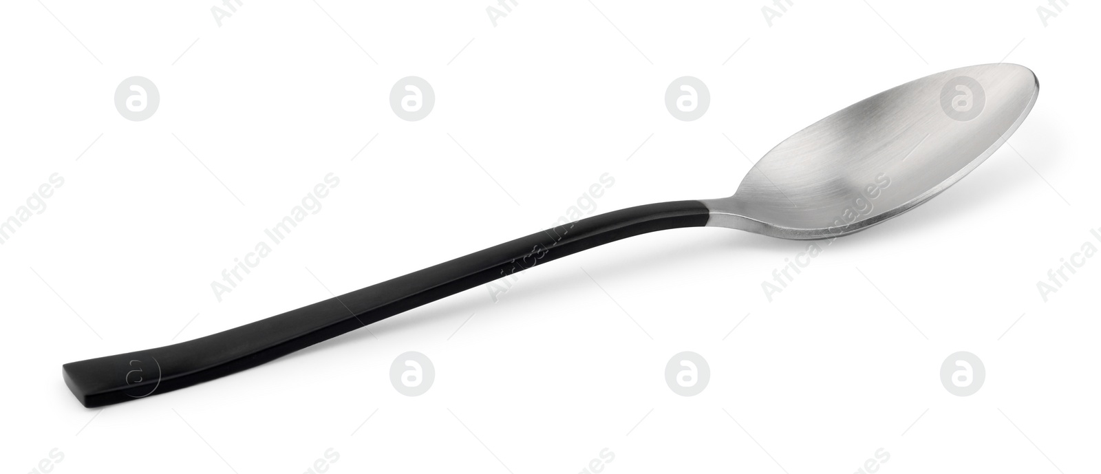 Photo of One new shiny spoon isolated on white