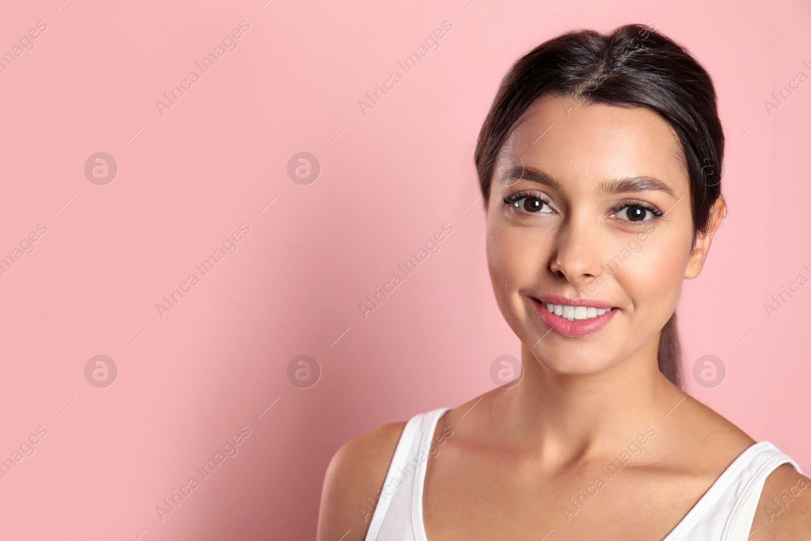 Photo of Young woman with healthy teeth on color background. Space for text