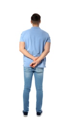 Young man in casual clothes posing on white background