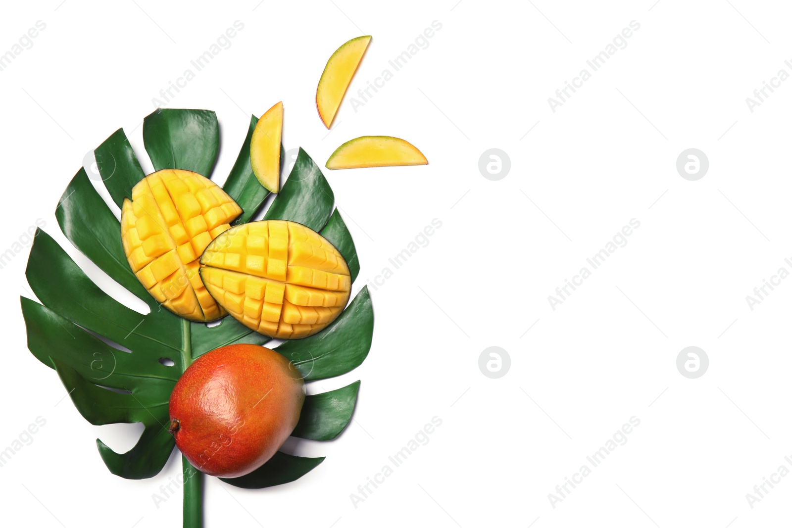 Photo of Delicious mango and green leaf isolated on white, top view. Space for text