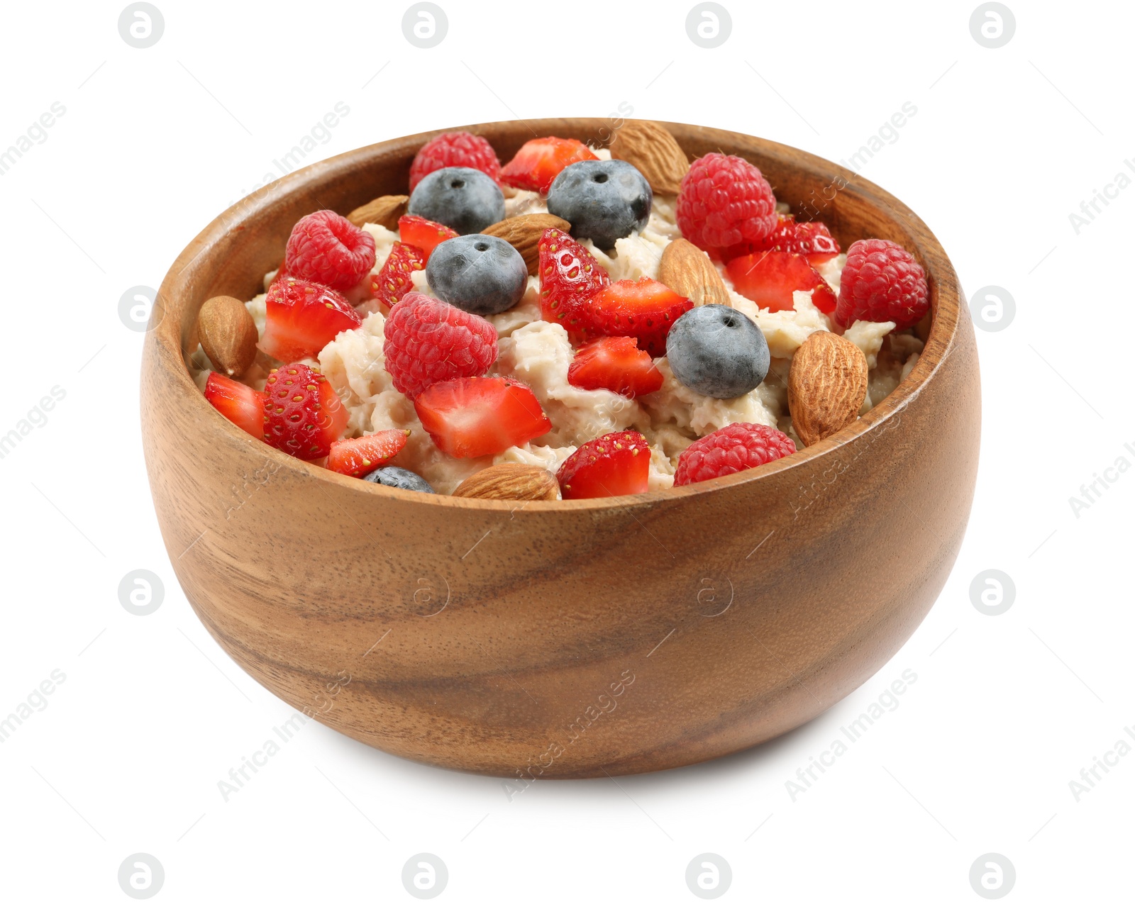 Photo of Tasty oatmeal porridge with berries and almond nuts in bowl on white background