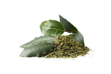 Photo of Heap of ground bay leaves and fresh twig on white background