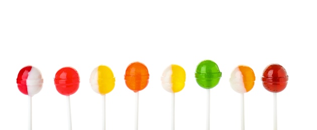 Photo of Different tasty colorful candies on white background