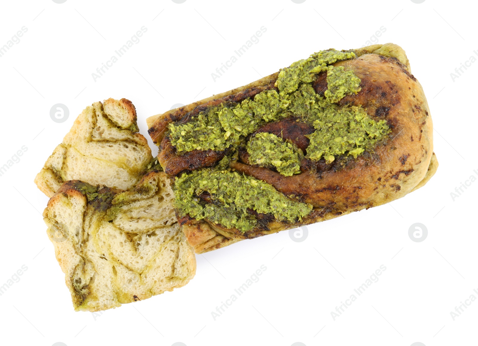 Photo of Freshly baked pesto bread isolated on white, top view