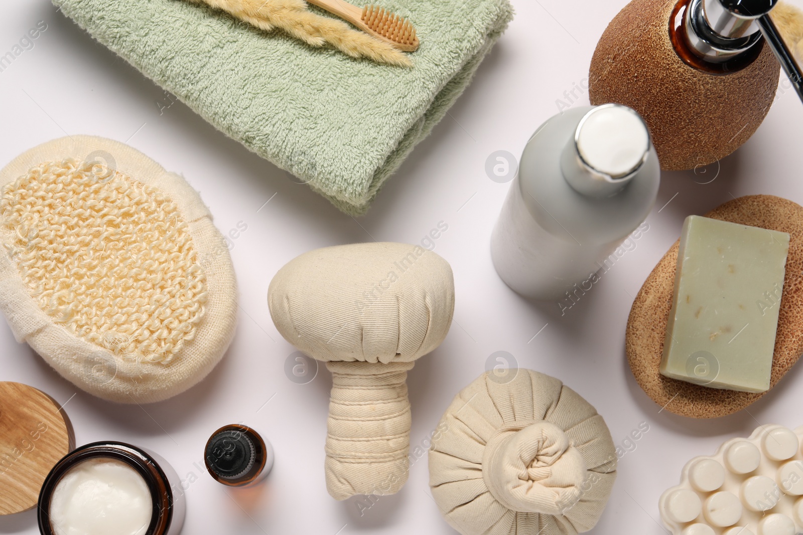 Photo of Bath accessories. Different personal care products and dry spikelet on white background, flat lay