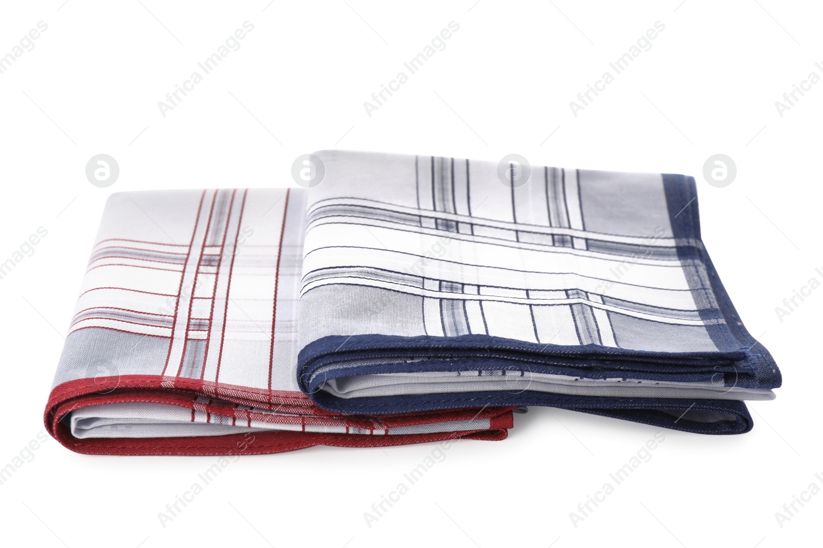 Photo of Folded handkerchiefs on white background. Stylish accessory