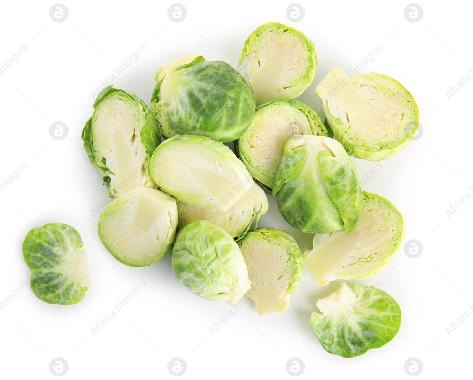 Photo of Pile of cut Brussels sprouts isolated on white, top view