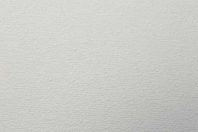 Blank white canvas as background, closeup view