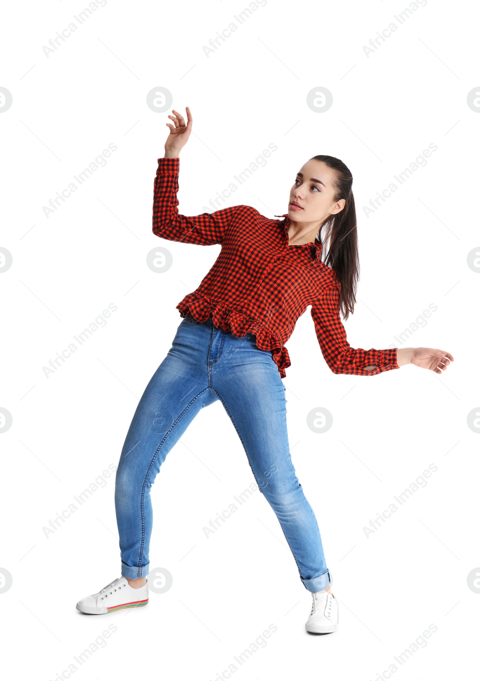 Photo of Young woman attracted to magnet on white background