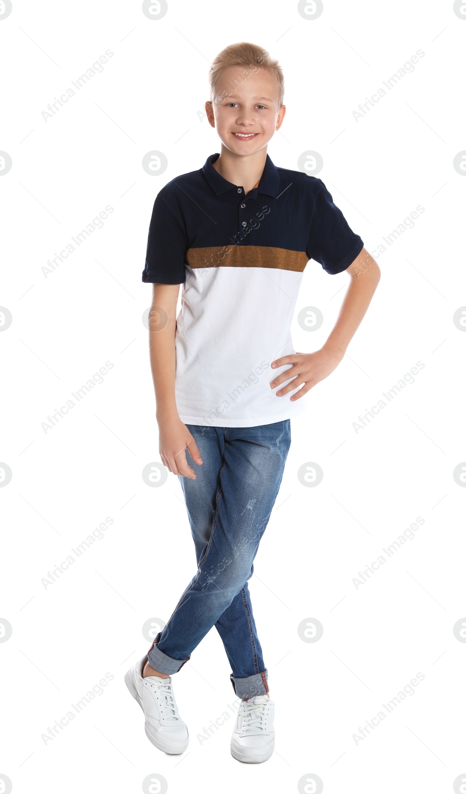 Photo of Full length portrait of teenage boy on white background