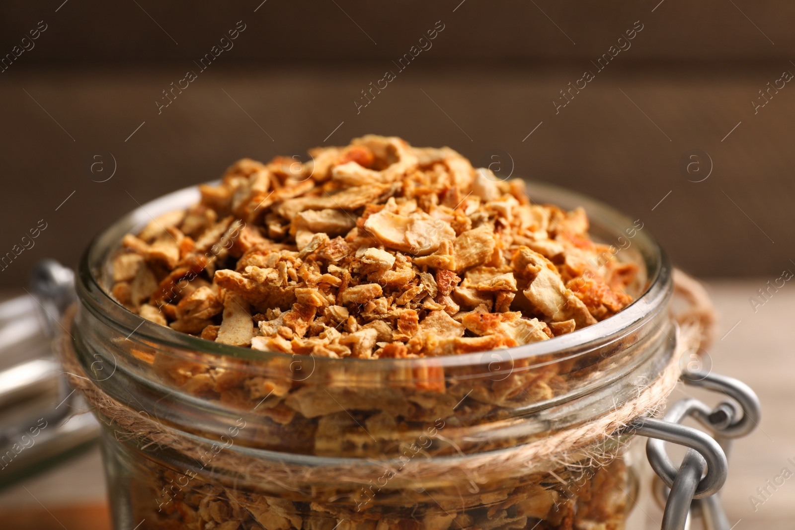 Photo of Jar of dried orange zest seasoning, closeup