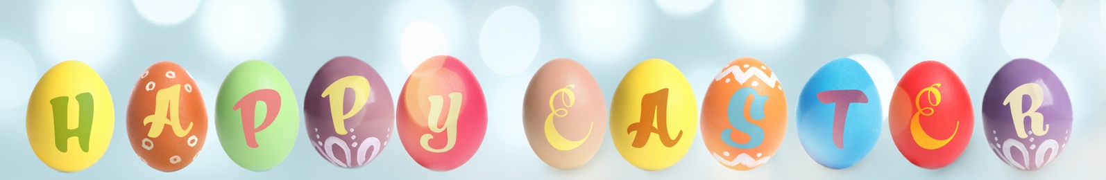 Image of Happy Easter. Colorful dyed eggs on light blue background, banner design