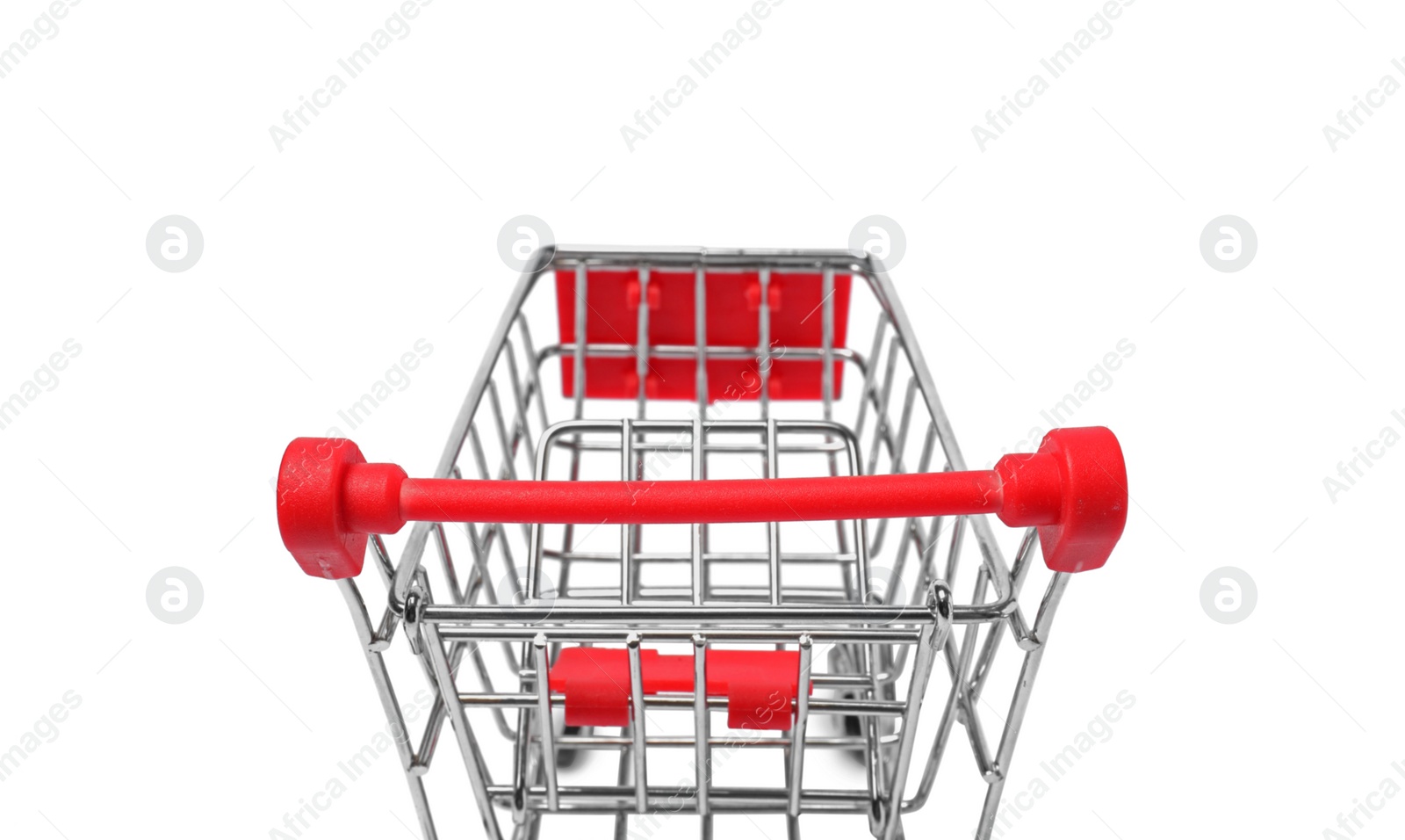 Photo of Empty mini metal shopping cart isolated on white